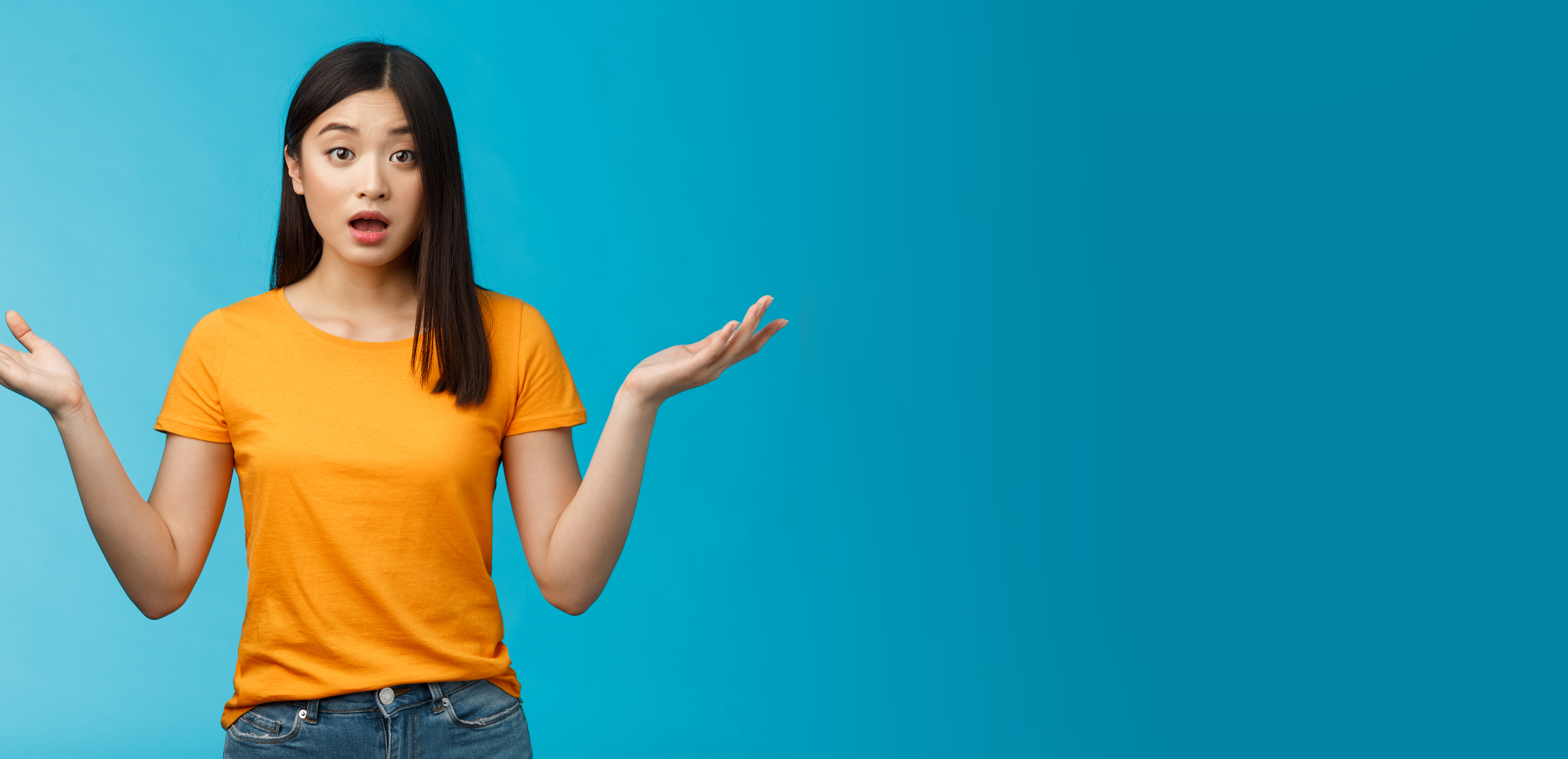 Woman shrugging, unsure about booking a cleaner