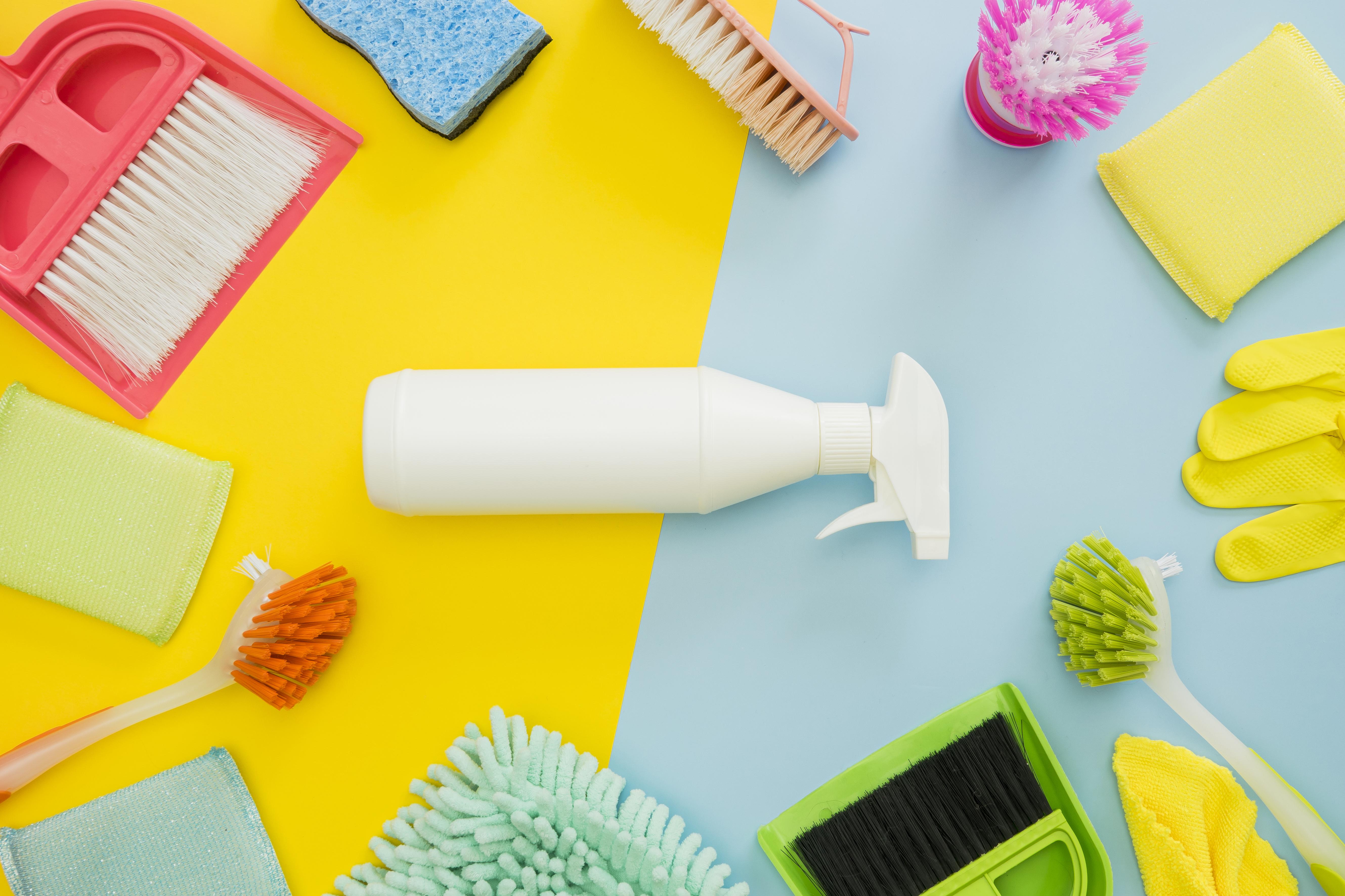 Cleaning tools: brushes, dustpan, spray bottle and gloves