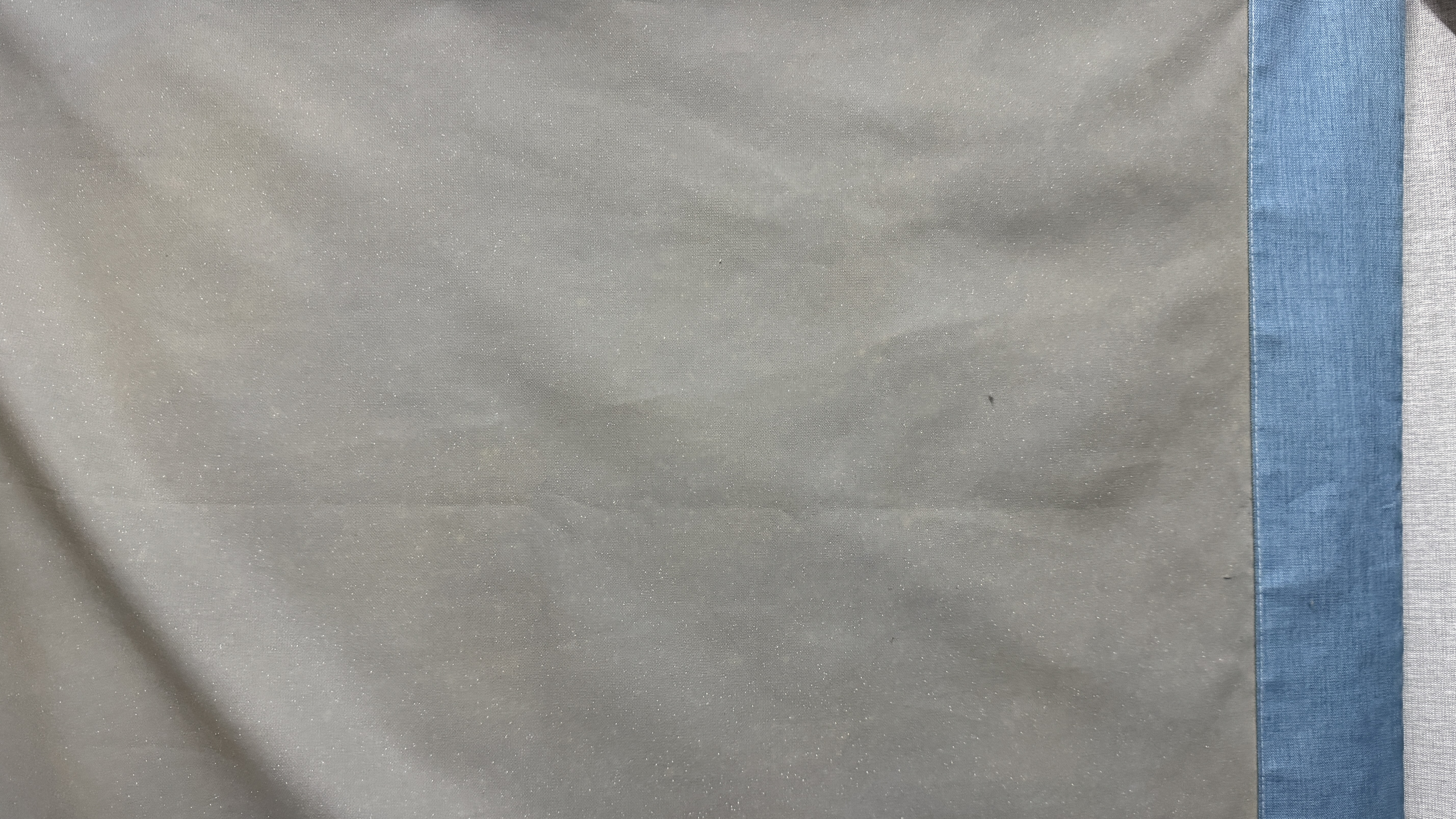 Curtain lining faded along its edge